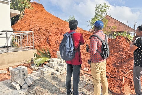 GSI officials inspect the site on Varkala Cliff on Monday where demolition work is progressing 