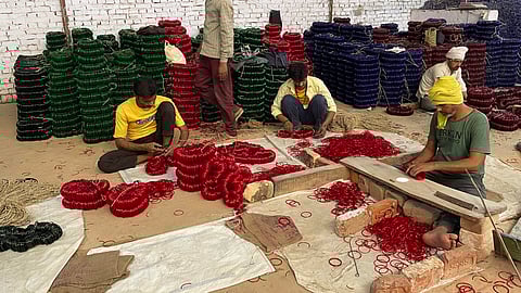 Bangle making workers inside a factory, in Firozabad.