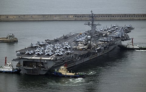 The Theodore Roosevelt (CVN 71),  a nuclear-powered aircraft carrier is anchored in Busan, South Korea, Saturday, June 22, 2024.