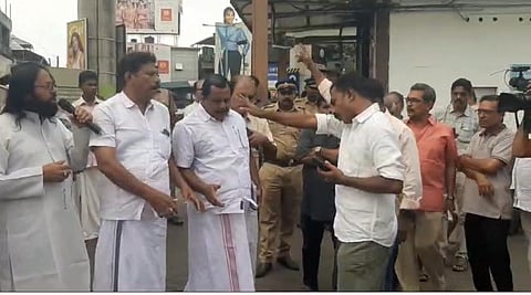 Believers protesting infront of  the St.George church Edappally on Sunday.