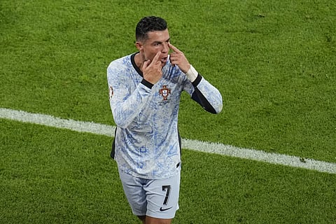 Portugal's Cristiano Ronaldo gestures as he leaves the pitch at half time during a Group F match between Georgia and Portugal at the Euro 2024 soccer tournament in Gelsenkirchen, Germany, Wednesday, June 26, 2024.