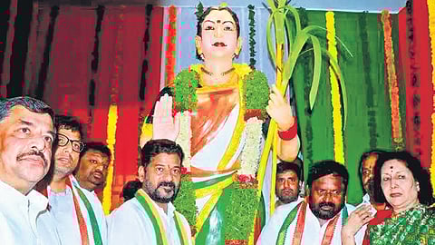 A file picture from September 2022 shows A Revanth Reddy and his party colleagues during the inauguration of the Congress version of Telangana Talli 
statue at Gandhi Bhavan at Hyderabad