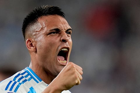 Argentina's Lautaro Martinez celebrates scoring his side's opening goal against Chile during a Copa America Group A soccer match on June 25, 2024.
