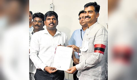 Durai Vaiko receiving the winning certificate from returning officer 
M Pradeep Kumar