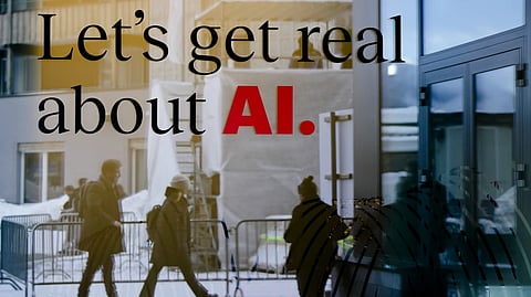 People are reflected in a window of a hotel at the Davos Promenade in Davos, Switzerland, Jan. 15, 2024.