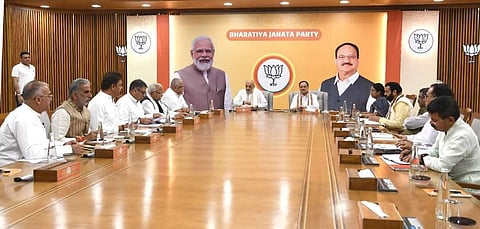 Senior BJP leaders meet at the party's headquarters to discuss preparations for the Haryana Assembly elections, in Delhi, on Monday.