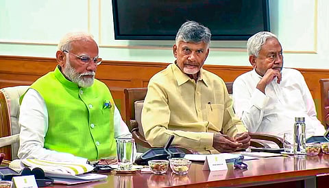 PM Narendra Modi with JD(U) leader and Bihar CM Nitish Kumar's JD(U).