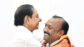 BRS chief K Chandrasekhar Rao greets Naveen Kumar Reddy who won the bypoll held for the Mahbubnagar local bodies MLC constituency on Sunday