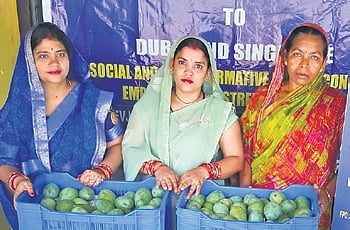 Women farmers with their stock