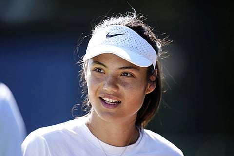 Britain's Emma Raducanu on the practice court at the All England Lawn Tennis and Croquet Club in Wimbledon.