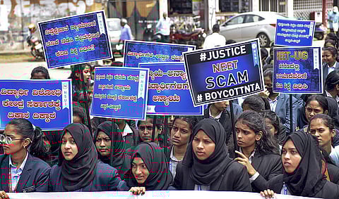 Chikkamagaluru: Students take part in a protest organised by NSUI over the alleged irregularities in NEET-UG 2024 results, in Chikkamagaluru, Friday, June 21