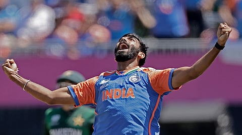 Jasprit Bumrah celebrates the dismissal of Pakistan's captain Babar Azam during the ICC Men's T20 World Cup cricket match between India and Pakistan at the Nassau County International Cricket Stadium in Westbury, New York, Sunday, June 9, 2024.
