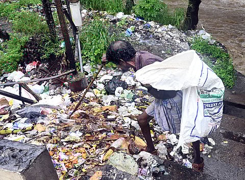 Sources said the accused had allegedly demanded Rs 15,000 per month from the woman to allow her to pick rags and metal scraps in the area. 