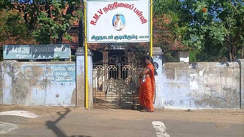 The Best Teacher award recipient standing outside the RMV middle school on Monday.
