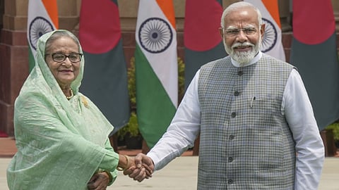 Prime Minister Narendra Modi with his Bangladeshi counterpart Sheikh Hasina before a meeting, at the Hyderabad House in New Delhi, Saturday, June 22, 2024. 