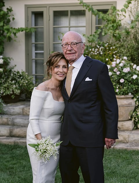 This image provided by News Corp. shows Rupert Murdoch and Elena Zhukova posing for a photo, Saturday, June 1, 2024, during their wedding ceremony in the vineyard estate in Bel Calif.