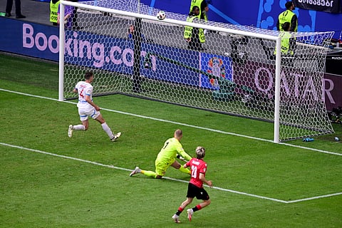 Georgia's Saba Lobjanidze, front, fails to score at the end of a Group F match against the Czech Republic at Euro 2024 (Photo | AP)