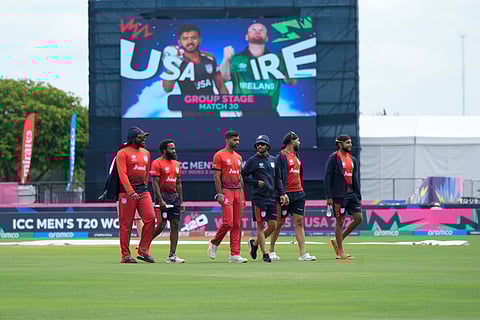 Team United States' cricketers walk in the field before an ICC Men's T20 World Cup cricket match between the United States and Ireland at the Central Broward Regional Park Stadium in Lauderhill, Fla., Friday, June 14, 2024.