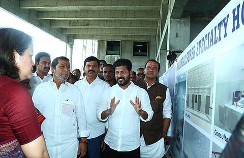Chief Miinister A Revanth Reddy along with some of his cabinet ministers inspoected the construction of Warangal Super Speciality Hospital in Warangal