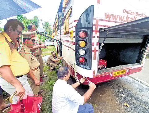 A team of MVD officials, led by Ernakulam RTO K Manoj, inspects the vehicle involved in the accident on Monday evening 
