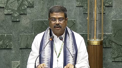  Union Minister of Education Dharmendra Pradhan takes oath as a Member of the 18th Lok Sabha during its First Session, at the new Parliament building, in New Delhi on Monday.