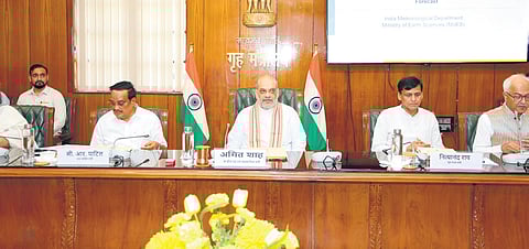 Home Minister Amit Shah chairs the meeting to review flood preparedness.