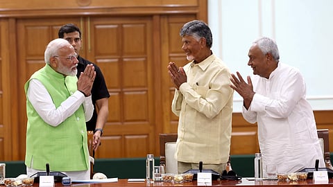 Prime Minister Narendra Modi with TDP chief N Chandrababu Naidu and JD(U) chief Nitish Kumar during National Democratic Alliance (NDA) meeting at PM's residence.