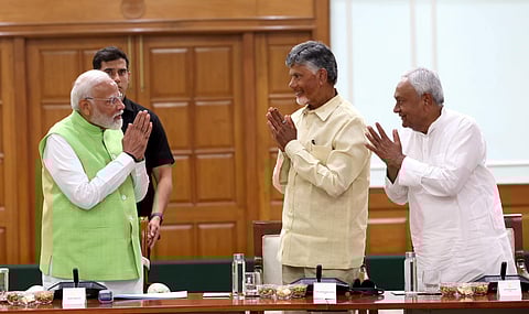 Prime Minister Narendra Modi with TDP chief N Chandrababu Naidu and JD(U) chief Nitish Kumar during National Democratic Alliance (NDA) meeting at PM's residence.