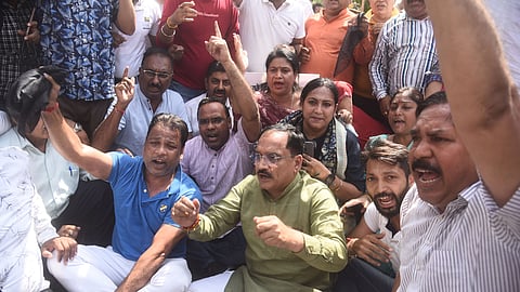 BJP Delhi chief Virendra Sachdeva with party workers at Raj Ghat