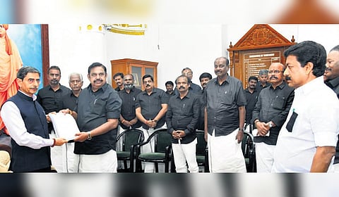 AIADMK general secretary Edappadi K Palaniswami submitting a memorandum to Governor RN Ravi in Chennai on Tuesday