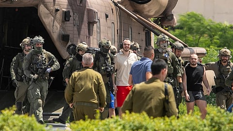 Andrey Kozlov, 27, left, and Almog Meir Jan, 21, two of four hostages who were kidnapped in a Hamas-led attack on Oct. 7, 2023, and were just rescued, arrive by helicopter to the Sheba Medical Center in Ramat Gan, Israel.