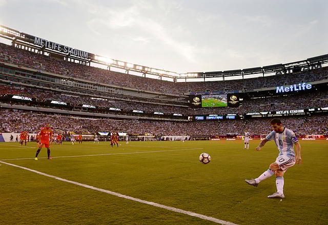 Argentina's Lionel Messi kicks from the corner during the first half of the Copa America Centenario championship match against Chile