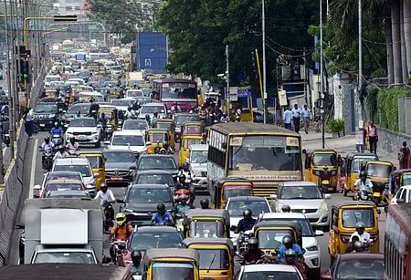Motorists seen moving at a snail's pace through Anna Salai. 