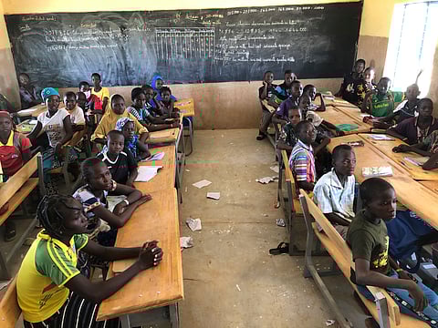 Children gather in a classroom at school in the village of Dori, Burkina Faso