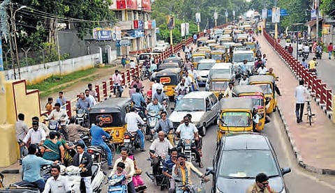 Vehicles stranded due to traffic jam at Arundalpet flyover in Guntur city.