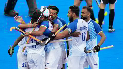 India hockey players celebrates their victory during the men's Group B hockey match between India and New Zealand at the Yves-du-Manoir Stadium during the 2024 Summer Olympics