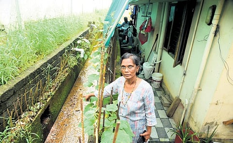 K P Sathi Devi in front of her house