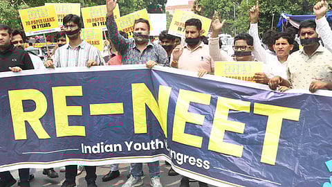 Indian Youth Congress activists stage a protest demanding the re-conduct of the NEET exam, in New Delhi on Monday, July 22, 2024.