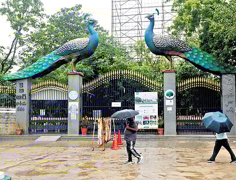 Visitors in front of the KBR Park entrance in Hyderabad 