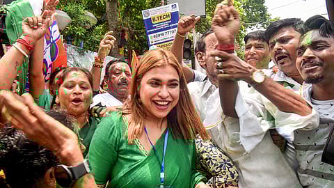 TMC supporters celebrate with Shreya Pandey, daughter of party candidate Supti Pandey, as she leads from Maniktala constituency during counting of votes for Assembly by-election, in Kolkata, Saturday, July 13, 2024