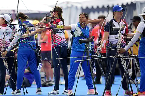 India's Ankita Bharat, center, competes during the women's archery individual ranking round at the 2024 Summer Olympics, Thursday, July 25, 2024, in Paris, France. 
