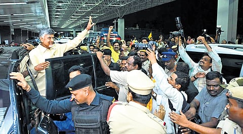 Chief Minister N Chandrababu Naidu greets his supporters at the Begumpet airport in Hyderabad on Friday.