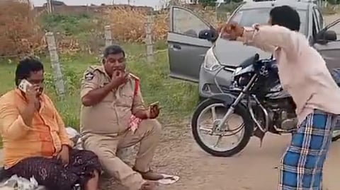 Guntur ASI drinks alcohol on duty, placed under suspension after viral video