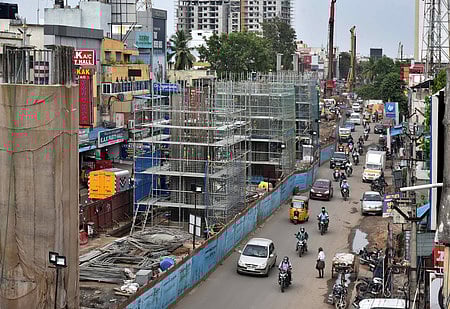 Originally, the NH wing had designed a four-lane flyover spanning 1,415 m from Amman Kovil to Saravanampatti on the Sathyamangalam Road. 