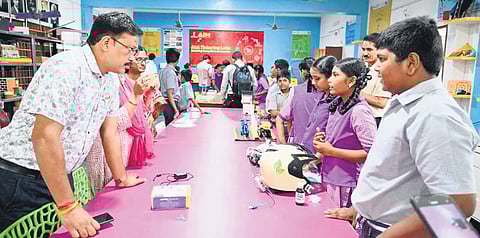 Representatives from the Education Departments of Jammu & Kashmir, and Chhattisgarh interacting with students of Penamaluru ZP High School 