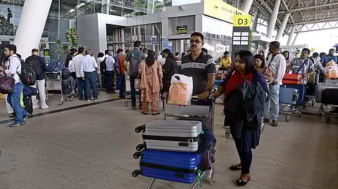 The Chennai International Airport was crowded on Saturday, as many airlines were doing check-ins manually.