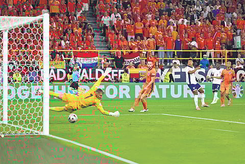 Ollie Watkins fires past the Netherlands keeper to send England into the final of the Euros at Dortmund on Wednesday