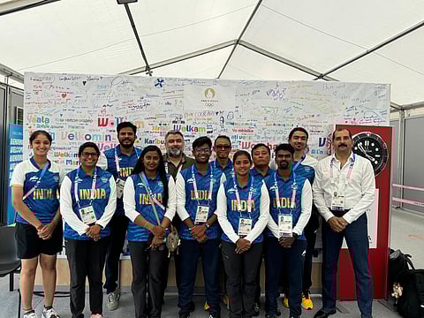 Indian archery team with Chef de Mission Gagan Narang (fifth from left) at the Olympic Games Village on Friday.