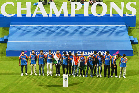 Team India pose during their felicitation ceremony at Wankhede stadium upon their arrival in Mumbai on July 4, 2024,