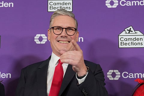 Britain's Labour Party leader Keir Starmer gives a thumbs up to his supporters after he was elected for the Holborn and St Pancras constituency, in London, Friday, July 5, 2024.